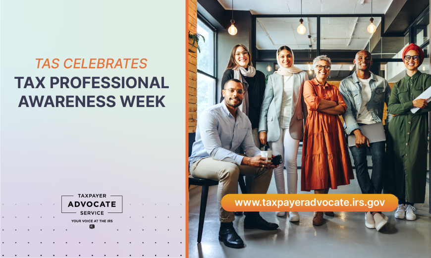 Image of 6 professionals of different nationalities standing in an office building.